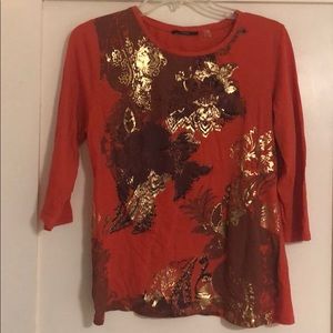 red maroon and gold top